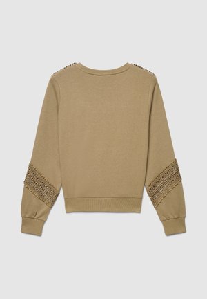 Sweat-shirt beige à manches longues avec des détails complexes en dentelle et perles sur le haut des bras et les épaules, avec des poignets et un ourlet côtelés.