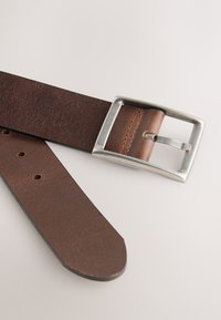 Brown leather belt with a silver metal buckle, featuring a smooth texture and five hole adjustments for size customization.