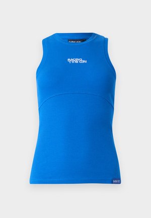 Blue sleeveless top made from ribbed fabric. Features a round neckline and a horizontal logo "RACING RED BULL" on the front.