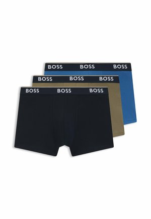 Three pairs of BOSS boxer shorts in navy, olive green, and blue. Each features a branded elastic waistband and a smooth cotton texture.
