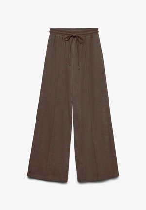 Pantaloni larghi marroni con una cintura regolabile. Realizzati in tessuto morbido con una finitura strutturata e senza motivi o dettagli visibili.