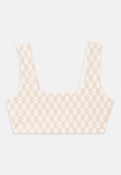 Branded bralette in cream with an all-over light orange geometric pattern. Features wide straps and a square neckline.