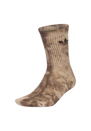 Brun tie-dye crew-strømpe med ribbet kant og mørkebrun Adidas trefoil-logo nær toppen.