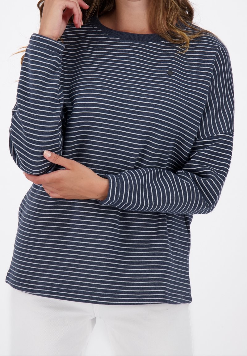 Maglietta a maniche lunghe a righe blu navy e bianche con scollo a girocollo, vestibilità ampia e tessuto morbido, con un piccolo dettaglio logo sul petto.