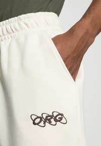 Jack & Jones JJIKANE ELLIOT  - Calças de fato de treino - turtledove