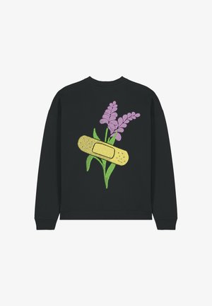 Black sweatshirt featuring a vibrant purple flower design with a yellow bandage overlay. Textured fabric with ribbed cuffs and hem.