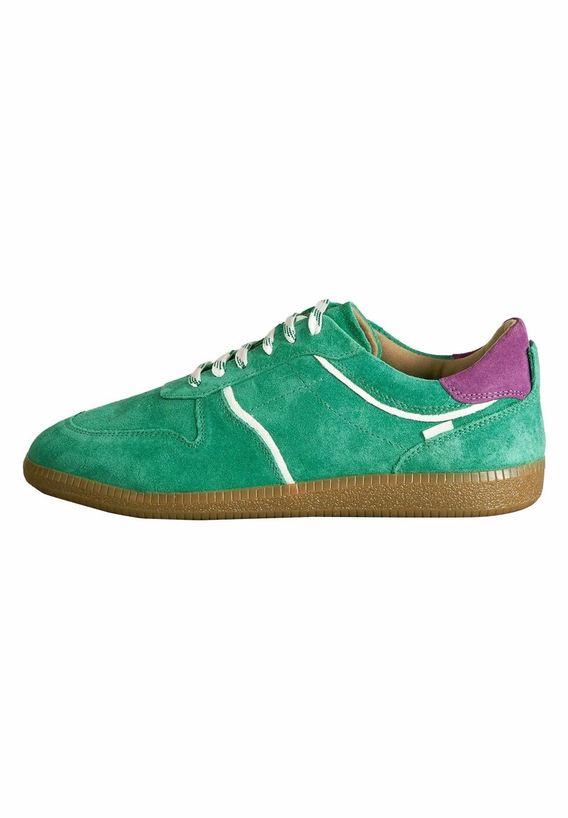 Green suede sneaker with white stitching, round toe, lace-up design, and a purple accent on the heel. Gum sole offers traction.