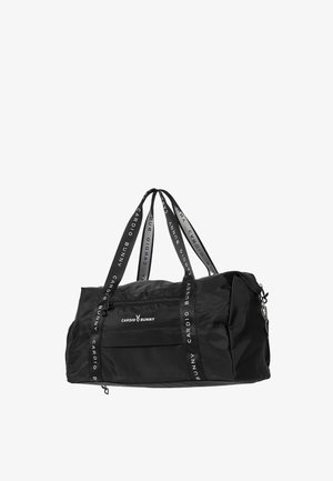 Bolsa de gimnasio negra con bolsillo frontal con cremallera y texto de marca "Cardio Bunny" en el cuerpo y las asas.