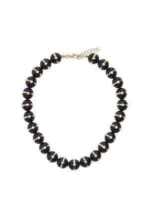 Naszyjnik z czarnych koralików o gładkim wykończeniu, z naprzemiennymi złotymi akcentami i zapięciem na łańcuszek. Okręgi ułożone w jednolity wzór.