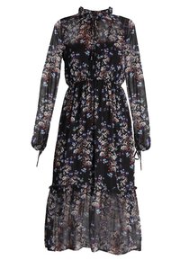 Pitkä musta kukkakuosisukmuoti, jossa on läpikuultavaa kangasta, kootut vyötärö, röyhelöhelma ja pitkät hihat, joissa on erilaisia pieniä värikkäitä kukkia.