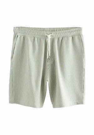 Shorts a righe in tessuto verde chiaro e bianco. Vita elastica con cordino, due tasche laterali e texture morbida e traspirante.