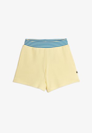 Pantaloncini giallo chiaro con elastico in vita a strisce blu e bianche, tasche laterali e piccolo logo nero sul lato destro.