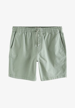 Lichtgroene zwemshorts gemaakt van zacht materiaal, met een elastische tailleband met trekkoord en zijzakken.