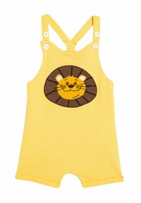 Mono de franjas amarillas con piernas cortas. Presenta un parche en forma de cara de león en marrón y amarillo en el frente, con tirantes cruzados y cierres de botón.