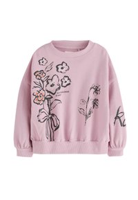 Felpa rosa realizzata in morbido tessuto, con motivi floreali neri e scritte sul fronte. Orlo ed elastici ai polsi, vestibilità ampia.