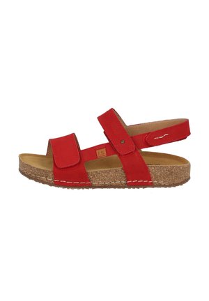 Red leather sandal with velcro straps, cork sole, and light stitching details. Open-toe design with a cushioned insole for comfort.