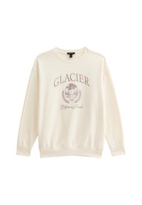 Sudadera de cuello redondo en color crema con un gráfico impreso de "Parque Nacional GLACIER" que presenta un diseño circular y acentos de laurel.