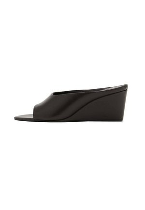 Black leather wedge mule with open toe and smooth, minimalist design, showing side profile on white background.