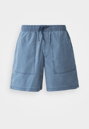 Cotton blend shorts in light blue with an elastic waistband, adjustable drawstring, two large front pockets, and a relaxed fit.