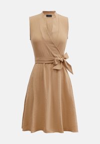 Tan sleeveless wrap dress with a V-neck, tie waist detail, and A-line skirt. Made from textured fabric, suitable for casual wear.