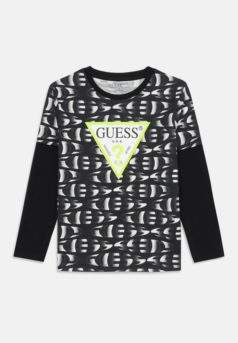 Svart langermet skjorte med grafisk mønster og en neon grønn trekantlogo i midten med "GUESS"-tekst, laget av myk stoff.