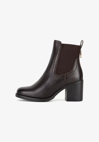 Atlasīts, dark brown