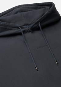 Dark gray hoodie with a drawstring hood, textured fabric, and embossed "TOMORROWLAND" logo on the front. Metal tips on the drawstrings.