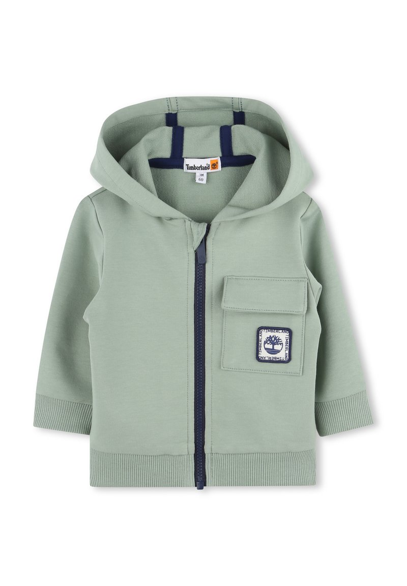 Lichtgroene rits-hoodie van zacht katoen, met een voorzak met marineblauwe afwerking en een logo-label. Geribbelde manchetten en zoom, met capuchon.