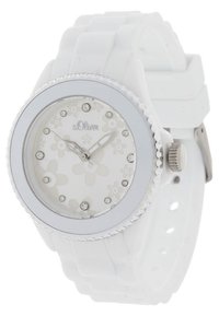 Biały silikonowy zegarek z kwiatowym wzorem na tarczy, srebrnymi akcentami, kryształowymi znacznikami oraz teksturowanym pierścieniem. Posiada solidny pasek i zapięcie.