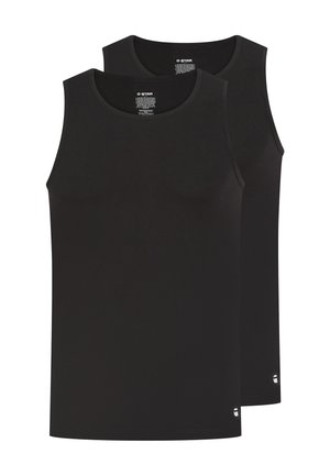 Zwei schlichte schwarze ärmellose Tanktops übereinander gestapelt, mit abgerundeten Ausschnitten und kleinem weißen Logo nahe dem unteren Saum.
