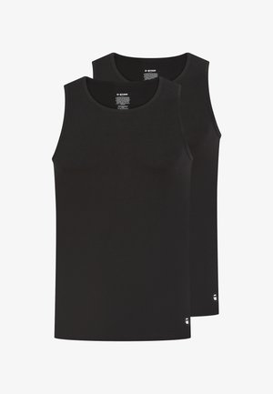 Zwei schlichte schwarze ärmellose Tanktops übereinander gestapelt, mit abgerundeten Ausschnitten und kleinem weißen Logo nahe dem unteren Saum.