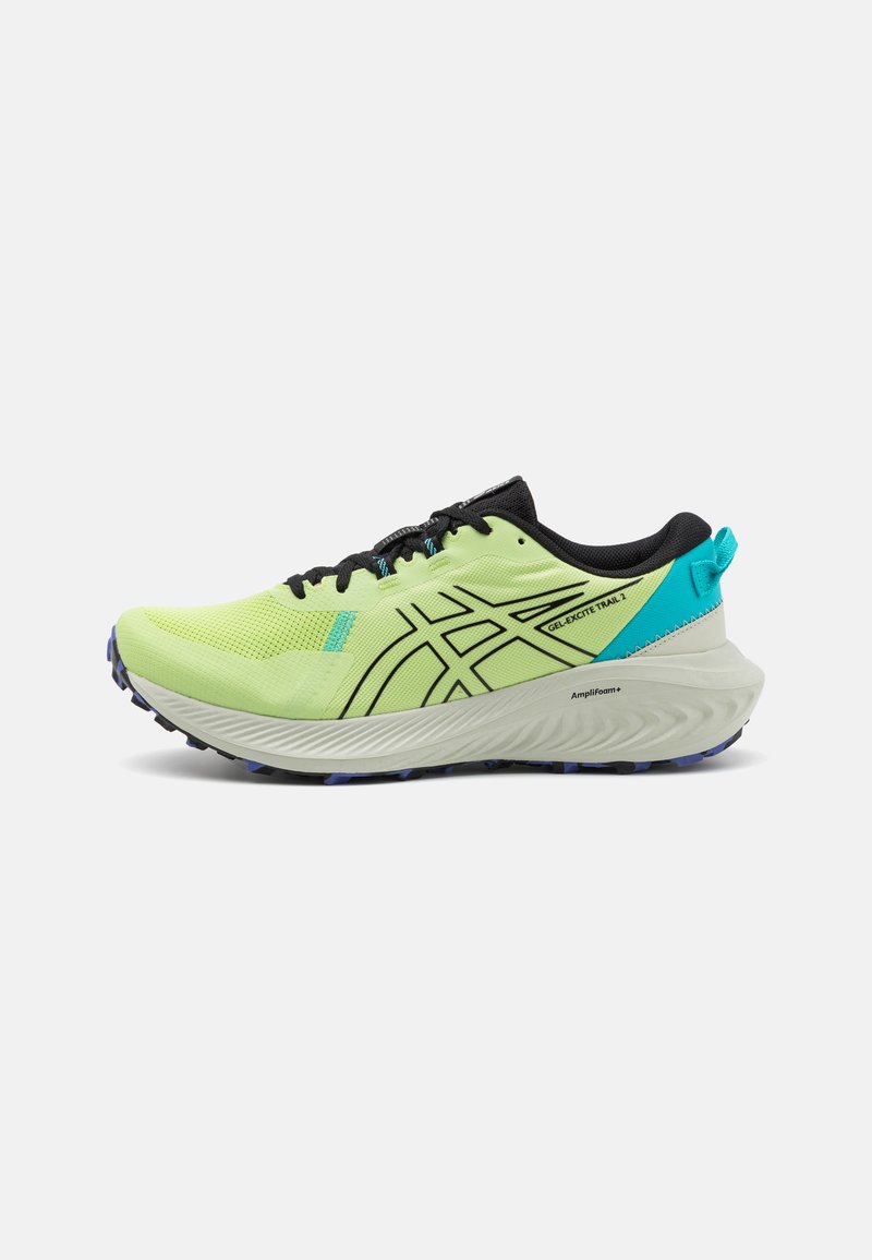 Scarpa sportiva gialla neon con accenti e lacci neri, caratterizzata da una tomaia texturizzata, un design elegante e una suola bianca imbottita con dettagli blu.