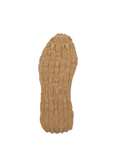 Semelle de chaussure en caoutchouc avec un motif de grip comportant des rainures ovales et circulaires, de couleur brun clair, conçue pour l'adhérence et la durabilité.