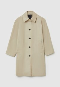 Beige Mantel mit geradem Schnitt, Kragen und Dreiviertelärmeln. Mit schwarzen Knöpfen und zwei vorderen Taschen. Glatte Stofftextur.