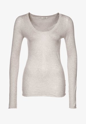 Hellbeiges, figurbetontes Langarmshirt mit Rundhalsausschnitt und weichem Strickstoff.