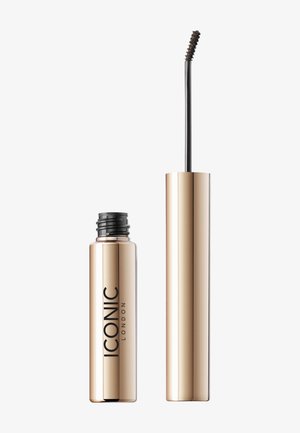 Tubo di mascara color oro con applicatore nero, dotato di un pennello curvo e logo in rilievo. Design elegante e cilindrico.