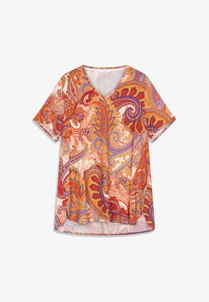 Bluza s kratkim rukavima i V-izrezom, s živopisnim paisley uzorkom u crvenoj, narančastoj i ljubičastoj boji na krem pozadini, s zakrivljenim rubom.