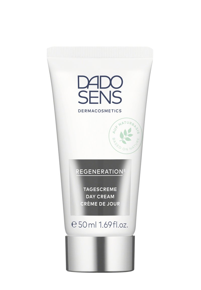 White tube with silver base; features "DADO SENS DERMAcosmetics" and "REGENERATION" text. Capacity: 50 ml. Green leaf icon indicating natural ingredients.