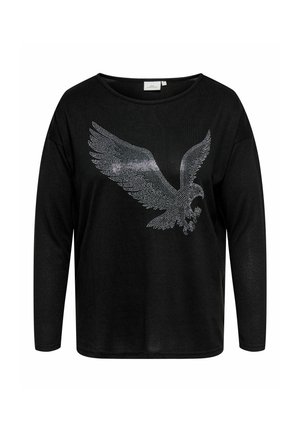 T-shirt noir à manches longues avec un grand motif d'aigle en strass sur le devant. Le tissu semble doux, avec une coupe décontractée et un large col.
