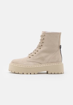 Bottines à plateau - beige