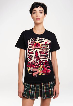 Black T-shirt featuring a colorful graphic print of a ribcage and skeleton-themed elements. Standard fit, short sleeves.