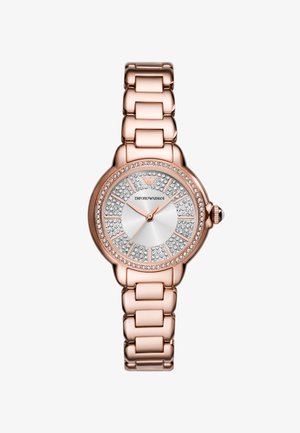 Reloj de oro rosa con caja redonda, esfera metálica texturizada y acentos de cristal. La pulsera cuenta con eslabones grandes para un aspecto robusto.