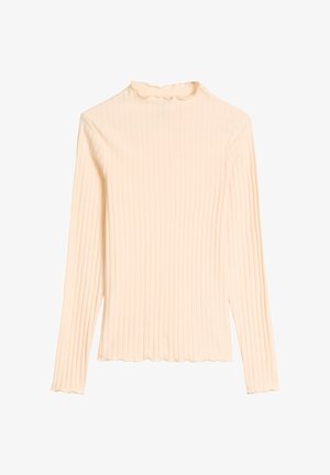 Haut beige à manches longues côtelé avec col montant et bordure en forme de laitue au niveau du col, des poignets et de l'ourlet.