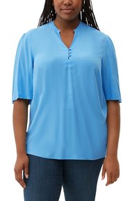 Blue short-sleeve shirt with a V-neck and five-button placket. Smooth texture, slightly loose fit, and straight hemline for comfort.