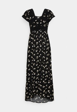 Schwarzes Maxi-Kleid mit floralem Muster, kurzen Puffärmeln, Spitzenakzenten am Ausschnitt und an der Taille, mit kleinen weißen und hellgelben Blumen.