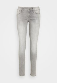 Smala jeans i ljusgrå denim med en klassisk femficksdesign, dragkedja och subtila blekningar för en mjuk känsla.