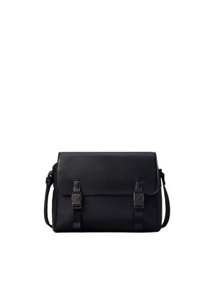 Black leather messenger bag with flap closure and two front buckle straps, featuring an adjustable shoulder strap.