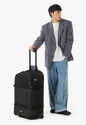 Eastpak, TRANSIT'R PRO M UNISEX - Maleta de cabina - black pro coated