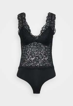 Μαύρο κορμάκι από δαντέλα με βαθύ V-ντεκολτέ, περιποιημένη δαντέλα στο τελείωμα και λείο κάτω μέρος. Ο σχεδιασμός συνδυάζει σύνθετα ανθοκομμένα μοτίβα με κομψή τελείωση.