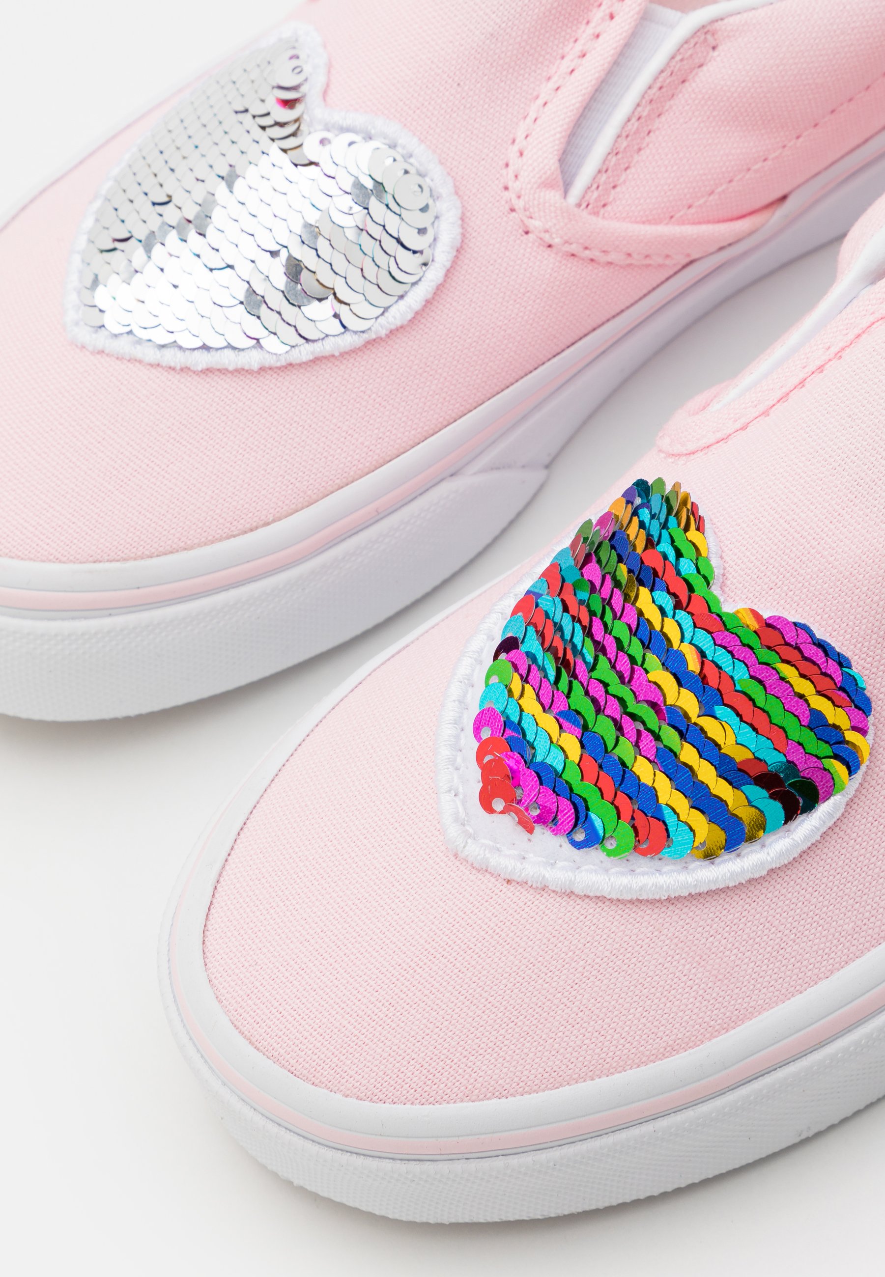 vans slip on blushing true white